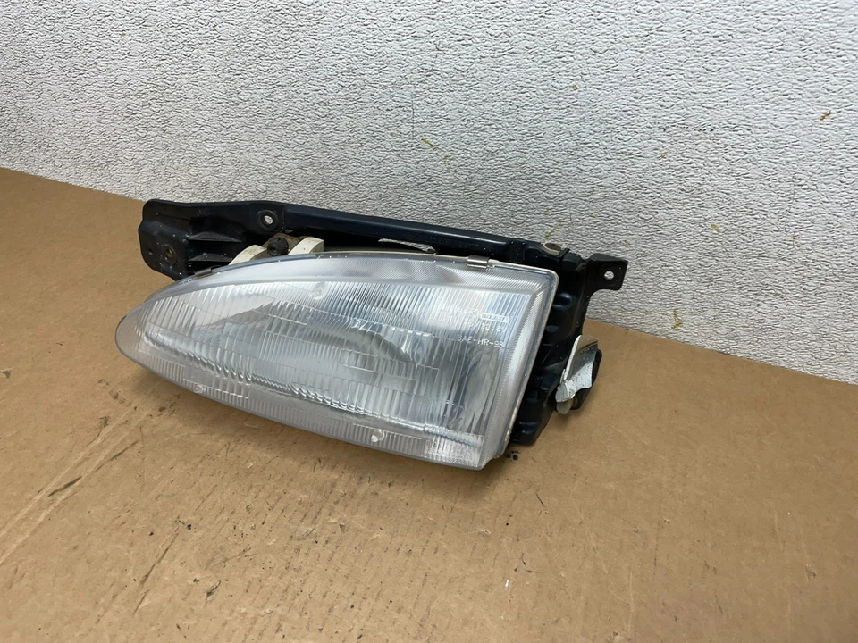 Faro lateral izquierdo del conductor Hyundai Accent 1995 a 1999 Q6661 DG Foto 2 de 4