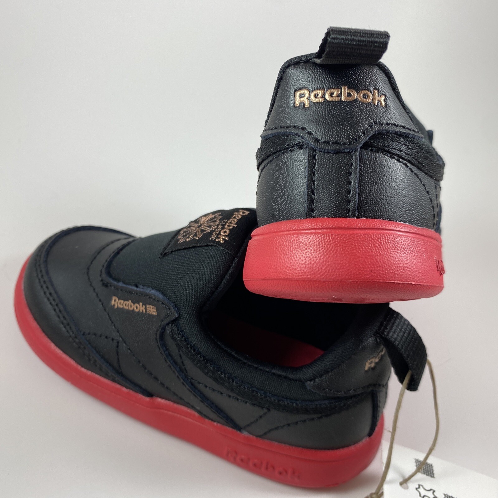 REEBOK CARDI B Baby Black Red Gold Slip-on Tennis Shoe Coateclub C Slip On  NEW | eBay