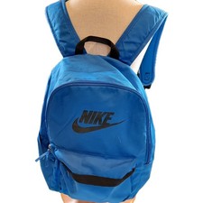 Blue Nike logo heritage backpack, outside zipper pocket, 2 side pockets, nylon