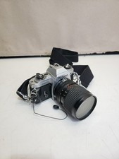 Vtg Nikon FG 35mm film camera with tokina at-x pro af 28-85mm Lense