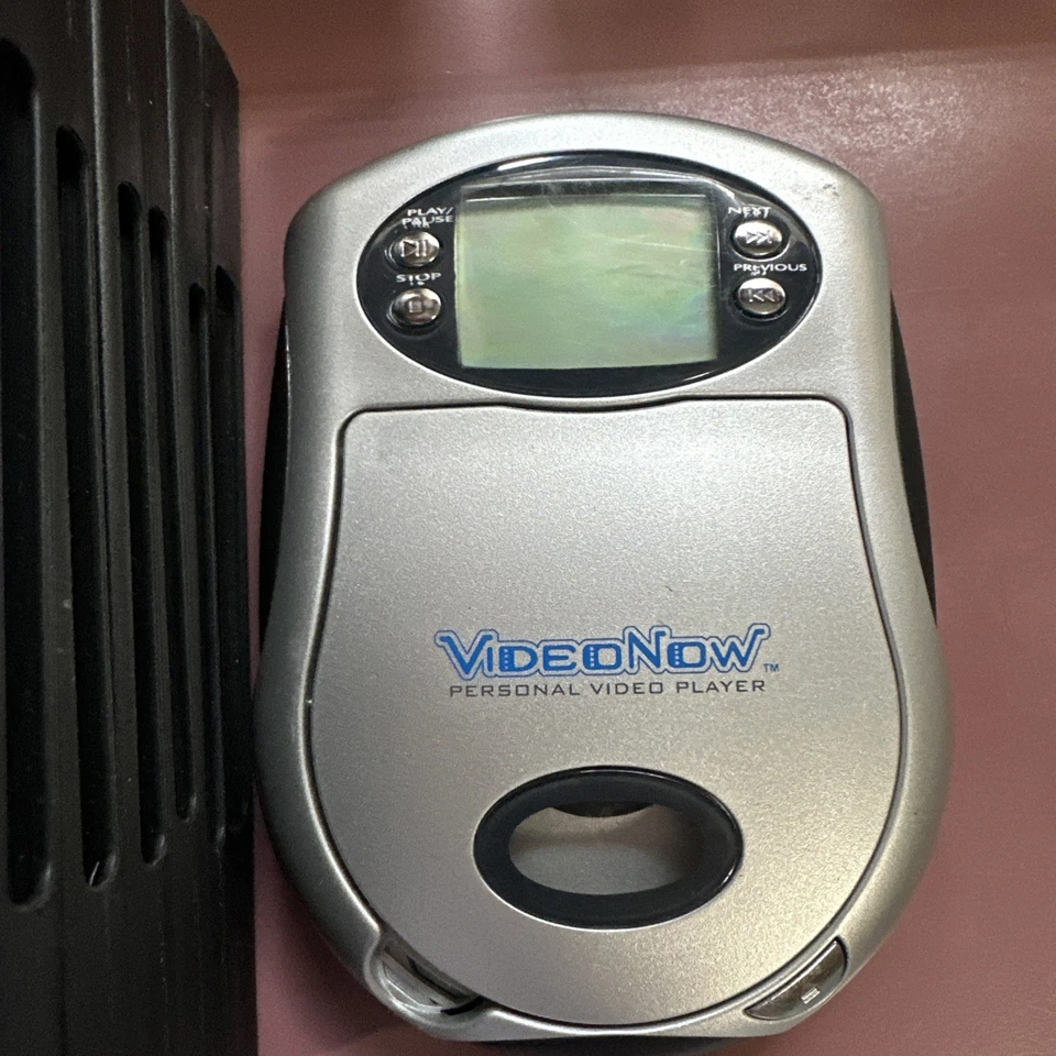 Reproductor de Video Personal VideoNow Vintage PLATEADO con toda la colección de discos Foto 2 de 4