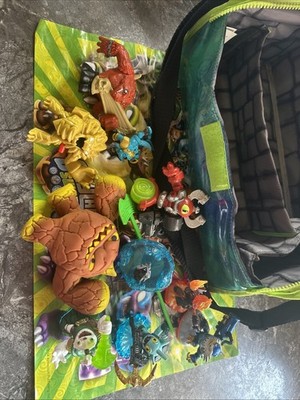 Skylanders storage case With Skylanders And Random Toys, Plus A Skylander Poster