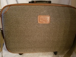 vintage luggage with wheels