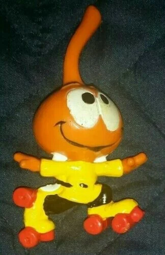 Vintage THE SNORKS Dimmy Finster Roller Skating Male Figurine Orange Figure