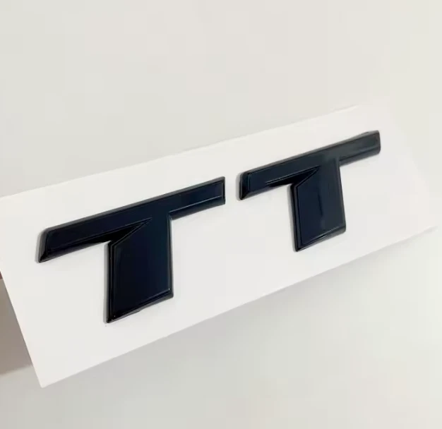 KIT COMPLETO LOGHI AUDI TT nero lucido fregi ANTERIORE + POSTERIORE targhetta TT - Immagine 4 di 4