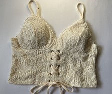 Elegant cream lace bralette with a stylish lace-up front size L