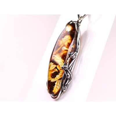 Handcarved Amber Mermaid Pendants Handcarved Amber Mermaid Pendants
