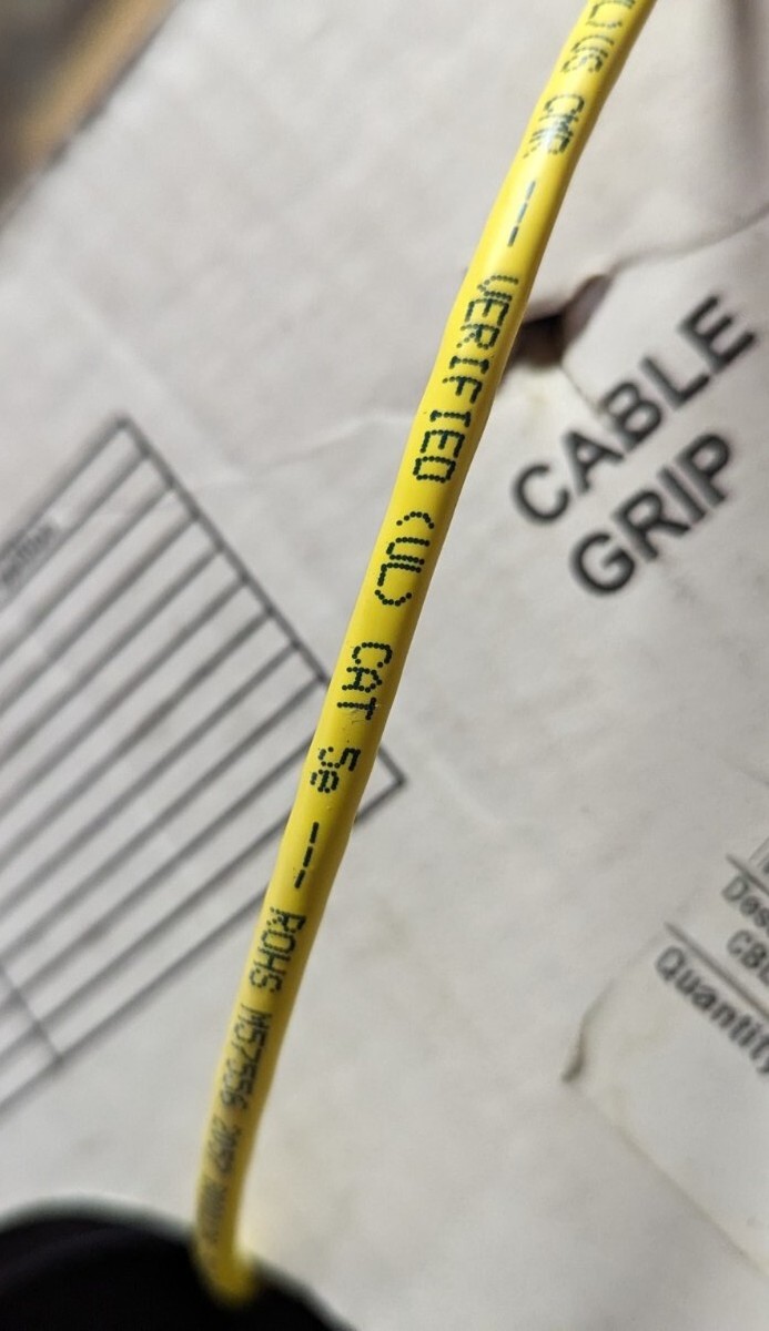 M57556B - Mohawk of Belden Networking Inc. 5E LAN RISER, YELLOW