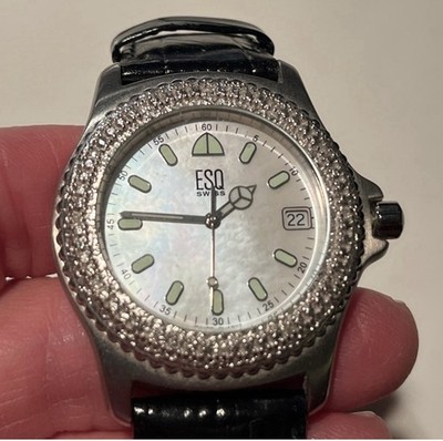 Lovely movado ESQ e5210 Swiss quartz watch. Mother of pearl face w/diamond bezel