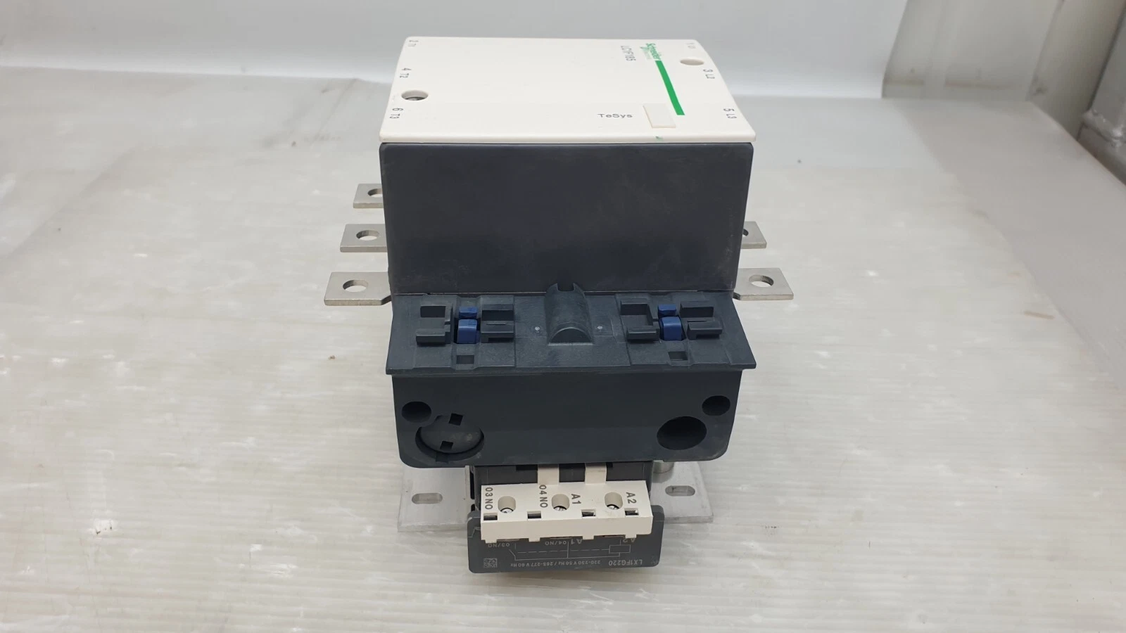 LC1F185 contactor coil block marked LX1FG220 with A1 and A2 terminals