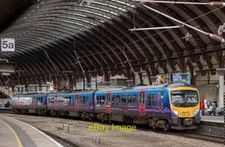 Photo 12x8 185124 in York station A Liverpool bound passenger service stop c2015