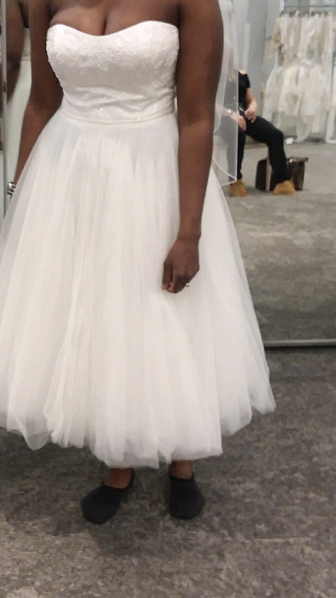 Lace Appliqued Tulle Tea-Length Wedding Dress. David’s Bridal