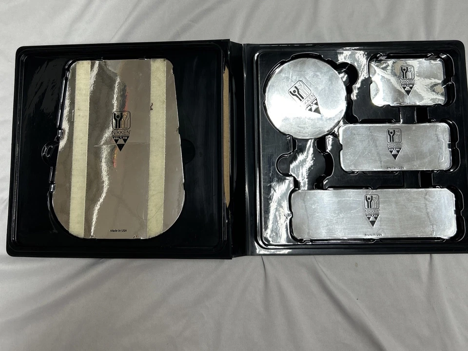 Almohadilla promocional con imán flexible trasero plateado Kenko Nikken Foto 2 de 4