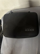 Go Pro Hero 4 Black Bundle Camera, Case, Charger, Batteries, Cards, Handle