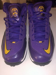 purple and black football cleats