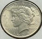 US 1934 Peace Silver Dollar, MS Uncirculated, Superb Goldish Toning, KM 150