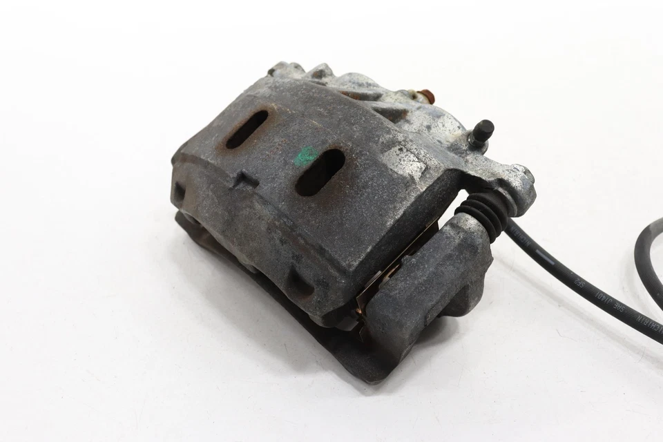 Pinza de freno de disco del lado del pasajero delantero derecho Nissan Armada 2018-2024 OEM Foto 3 de 4