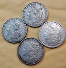 4- .9 SILVER MORGAN DOLLARS. LOW $$$ START AUCTION