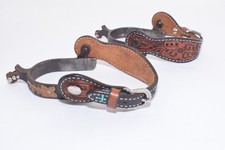 Vintage ladies leather spurs with copper flowers blue cross