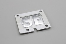 Genuine Range Rover 2002-2012 rear tailgate 'SE' badge (titan) LR008136