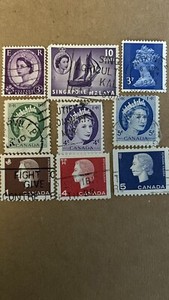 Vintage Queen Elizabeth postage stamp assortment 9 pc .
