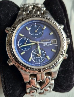 Uhr Seiko SQ100 Chronograph Quarz Unisex Armbanduhr blau Stahl Alarm 10 BAR 7T32 - Bild 1 von 4