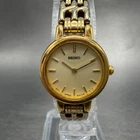 Seiko Watch Women 21mm Champagne Dial Gold Tone Round 1N00-1E09 New Battery BD7