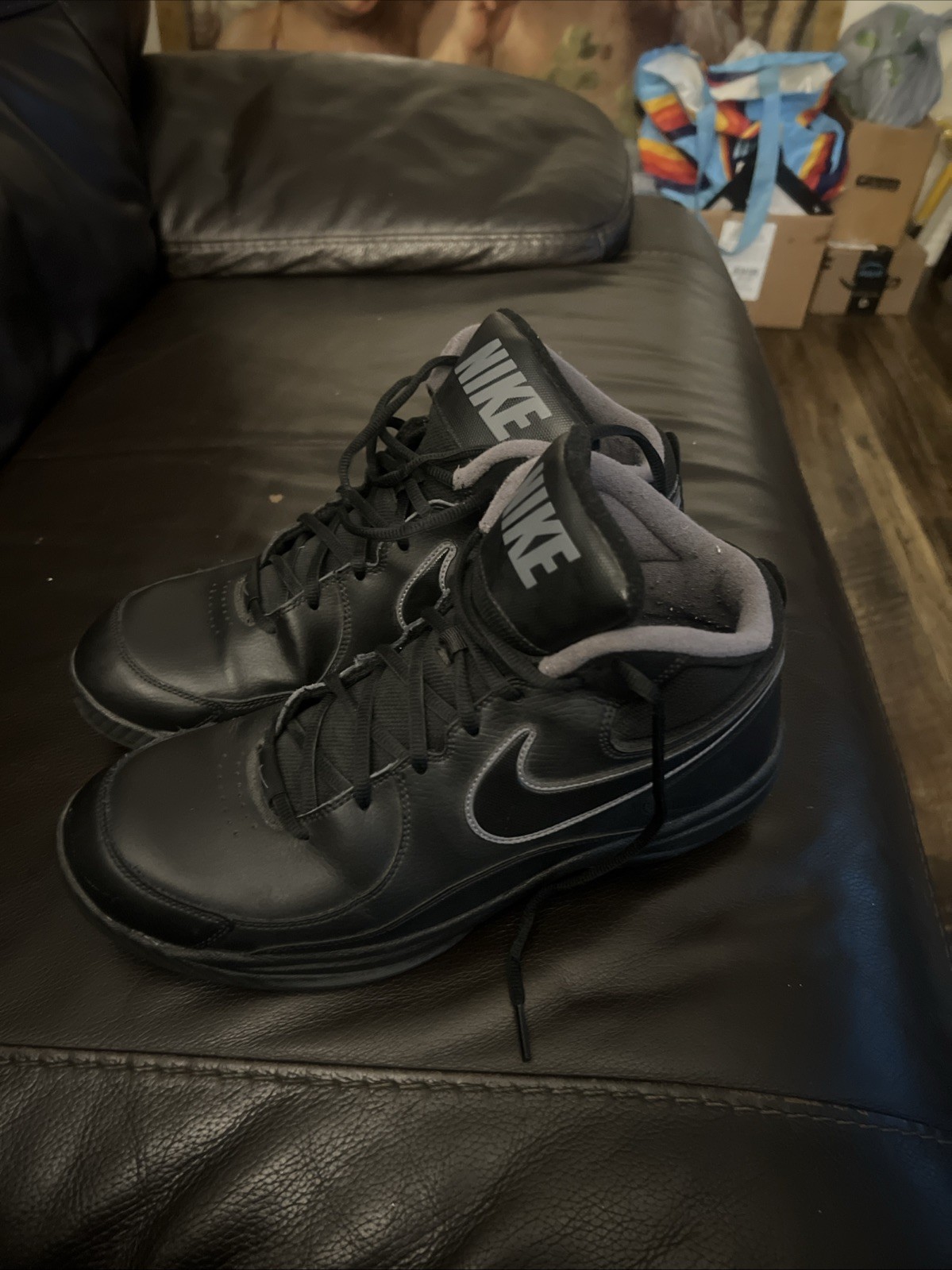 Nike durable work boots for men size 11 in black or brown