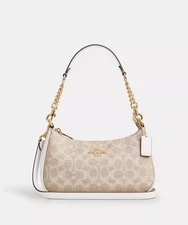 𝘤𝘰𝘢𝘤𝘩 Teri Shoulder Bag In Signature Canvas CV933 Outlet New