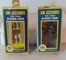 Vintage A.H.M. / 12 Telephone Poles   23 Railroad and Traffic Signs / HO Scale