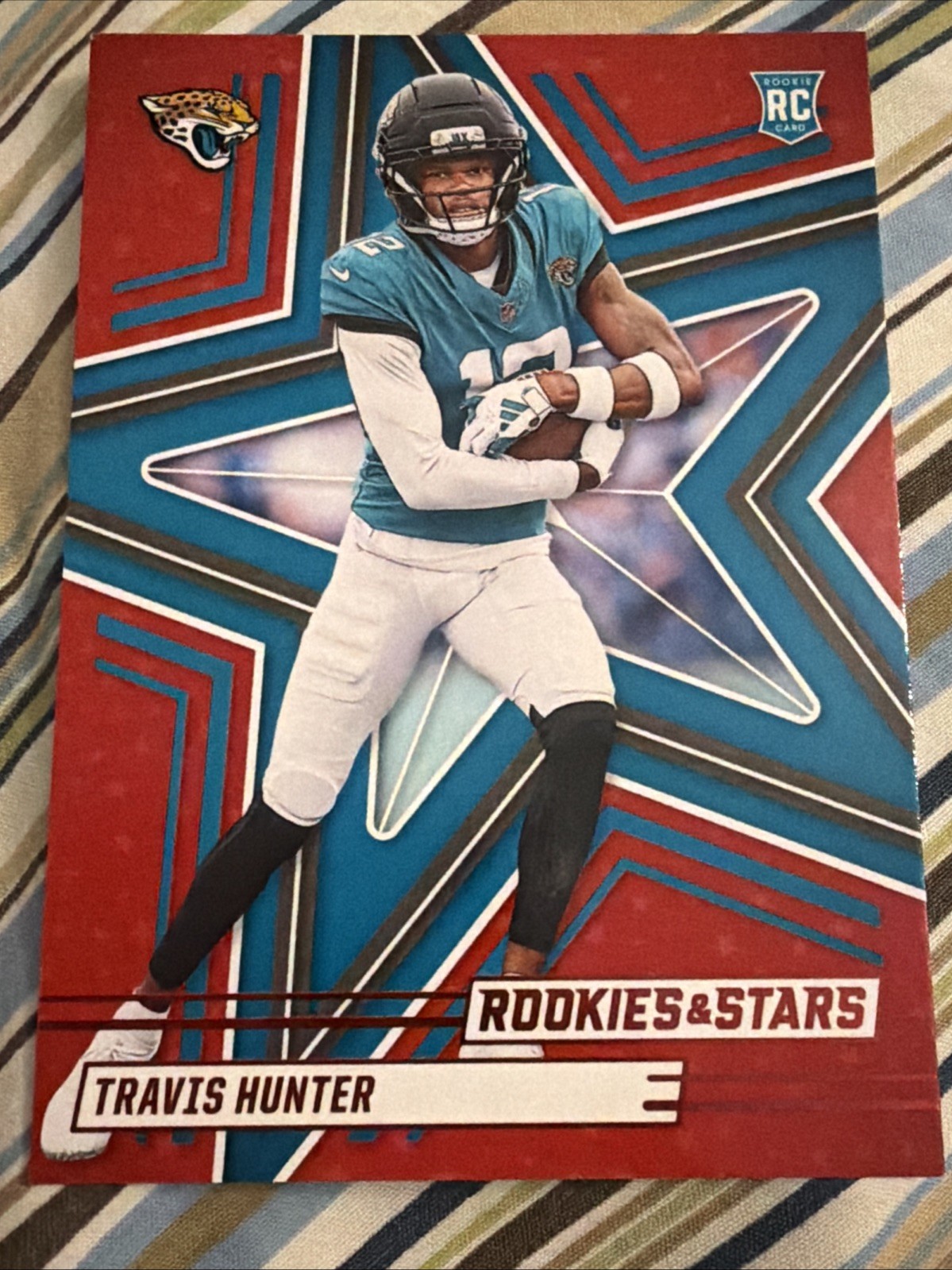 2025 Panini Rookies & Stars Red TRAVIS HUNTER (RC) #186 JACKSONVILLE JAGUARS 🏈