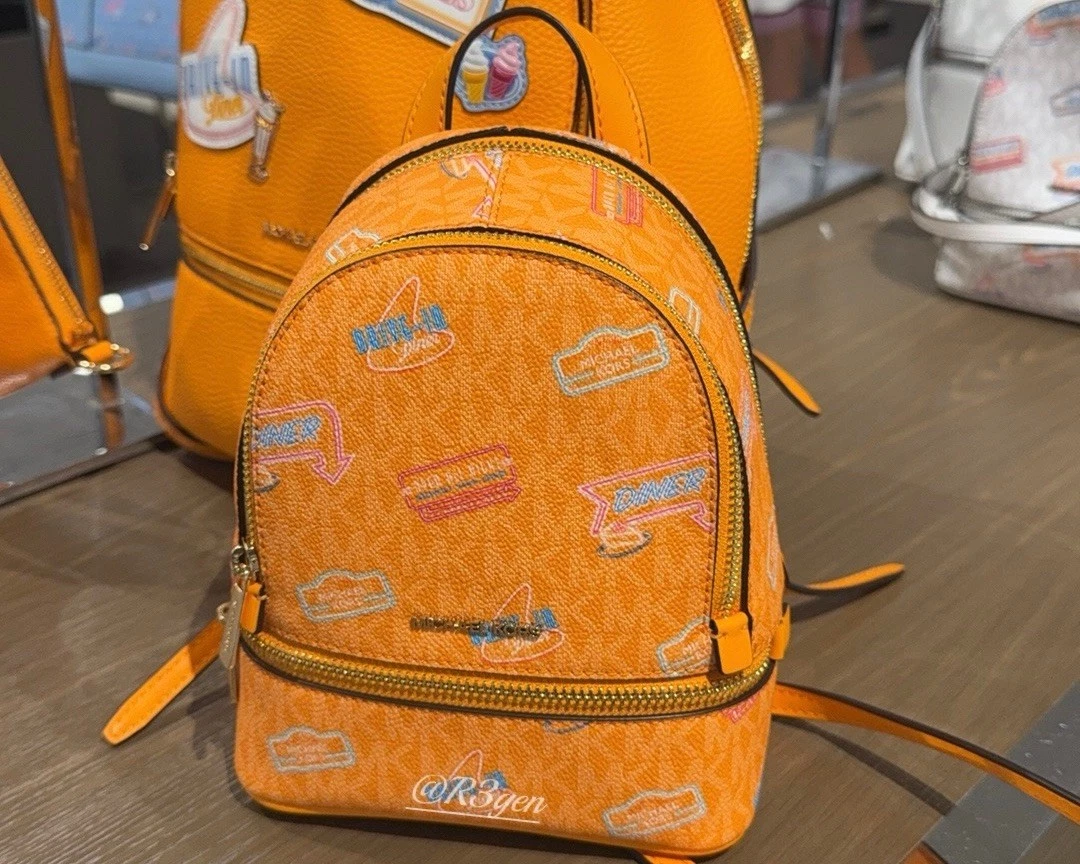 Michael Kors Vibrant Orange Mini Convertible Backpack Crossbody display picture 3