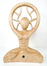 Nature, goddess woman feminine statue carved wood pagan