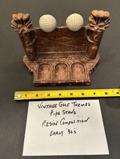 Portapipe vintage a tema golf e pipa a forma di mazza da golf.