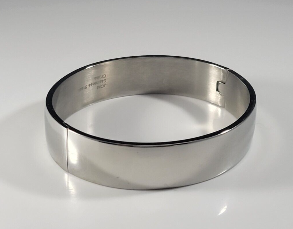 Signed JCM Stainless Steel Designer Bangle Clamp Bracelet in Silver Tone-image