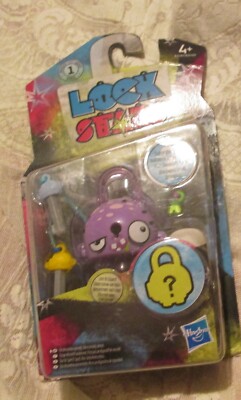Nagelneu. Hasbro Lock Stars lila Alien Spielzeug.