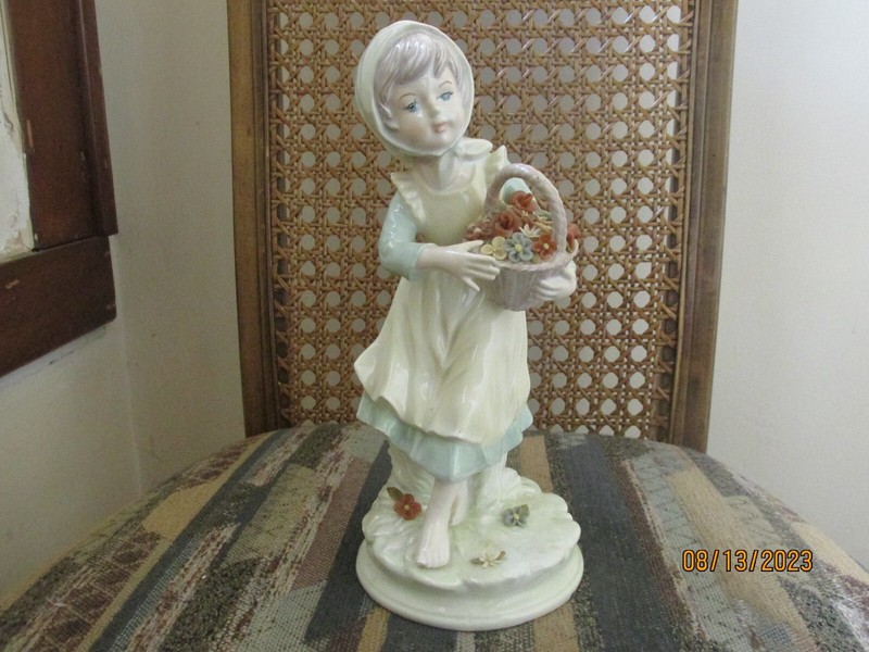 Onarco or Narco Young Lady Carrying a Basket of Flowers Figurine