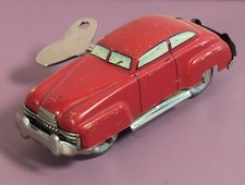 Vintage 1950s Red Tin Wind-Up Sedan Car Toy Made in US Zone Germany