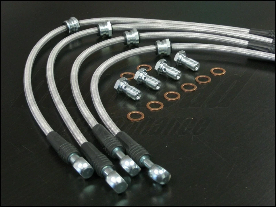 Líneas de freno trenzadas de acero inoxidable Techna-Fit 1993-1997 Ford Probe Foto 3 de 4