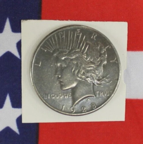 1928 Peace Silver Dollar - Almost Uncirculated Condition AU (J31)