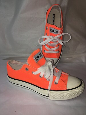 hyper orange chuck taylors