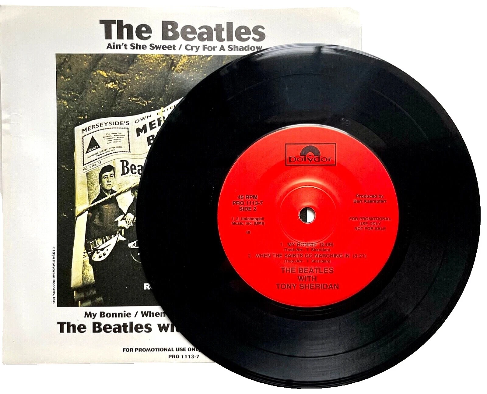 The Beatles Near Mint (NM or M -) Grading 45 RPM Speed Vinyl Records