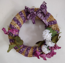 Straw Tangled wreath with purple, pink, white, green flowers and leaves 13"