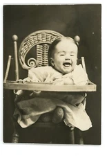 RPPC Cute Smiling Laughing Baby in High Chair Portrait Real Photo Postcard