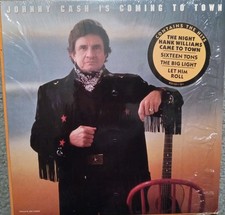 Johnny Cash vinyl. Is Coming To Town. 1987. Lite scratches. Overall good conditi