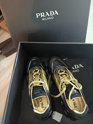 Prada Men s Cloudburst Sneakers Black And Gold Size 37/7