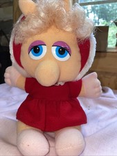 1987 Baby Miss Piggy by Henson Associates. Wearing Red Dress.