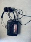 Sony Walkman WM2011 cassette player RCA headphones as-is for repair, motor runs