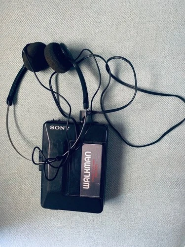 Sony Walkman WM2011 cassette player RCA headphones as-is for repair, motor runs