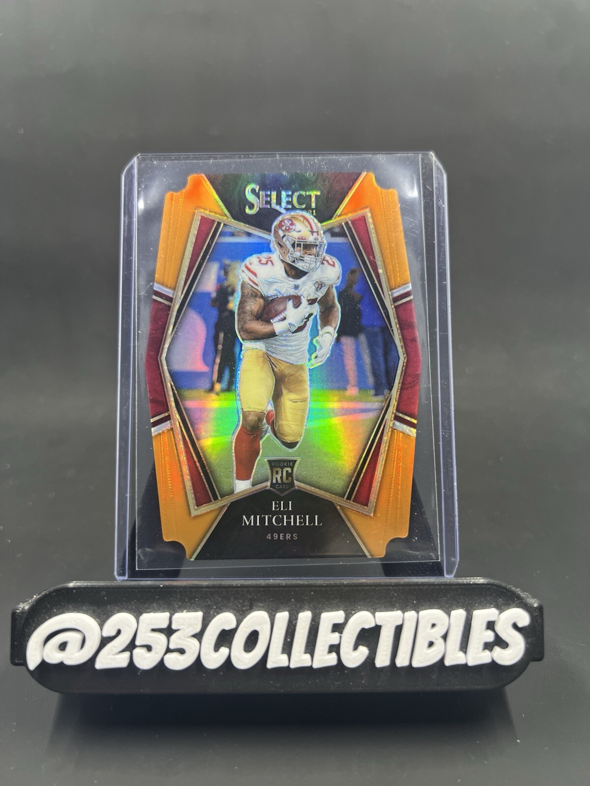 2021 Panini Select Eli Mitchell Rookie Premier Level Orange Prizm Die-Cut /249
